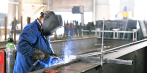 a man providing metal fabrication services with welding and assembly.