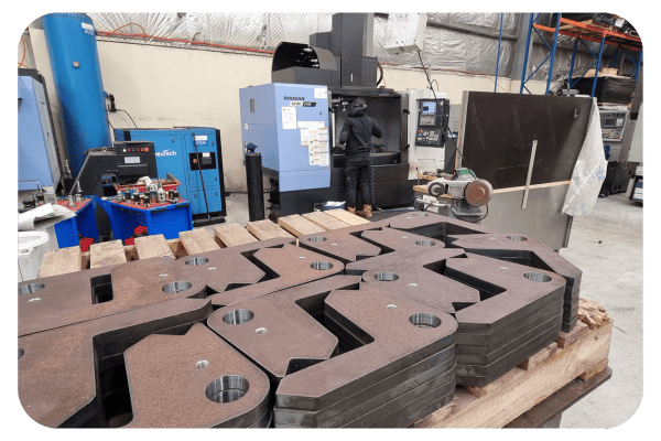 milling components in a large scale CNC machining shop